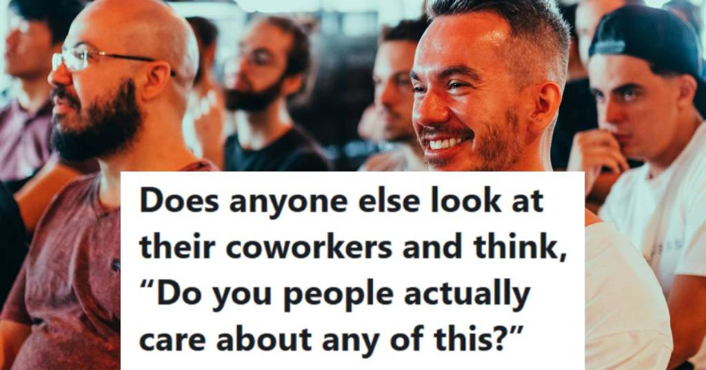 Man sitting through another corporate meeting thinking of something funny
