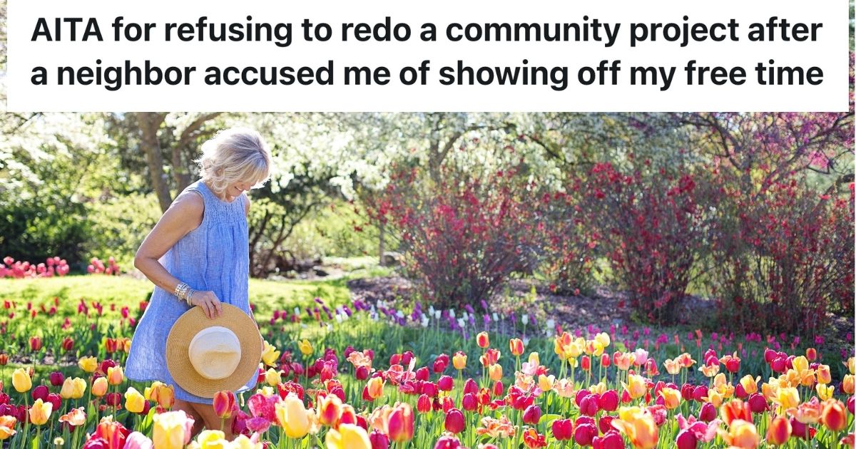Woman walking through a field of tulips