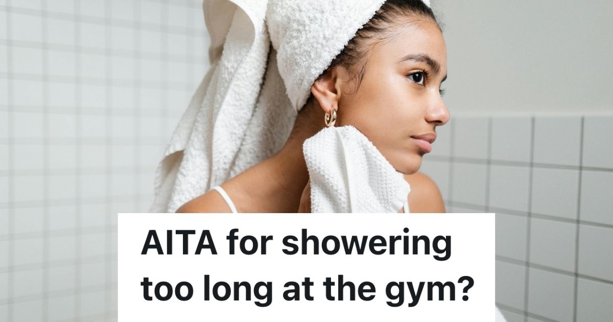 Woman drying her neck in the shower
