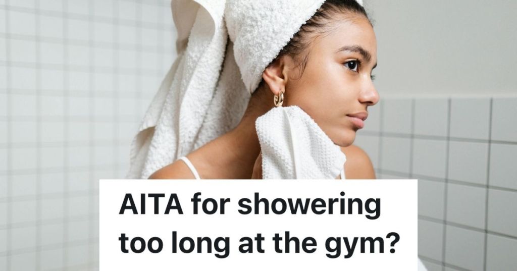 Woman drying her neck in the shower