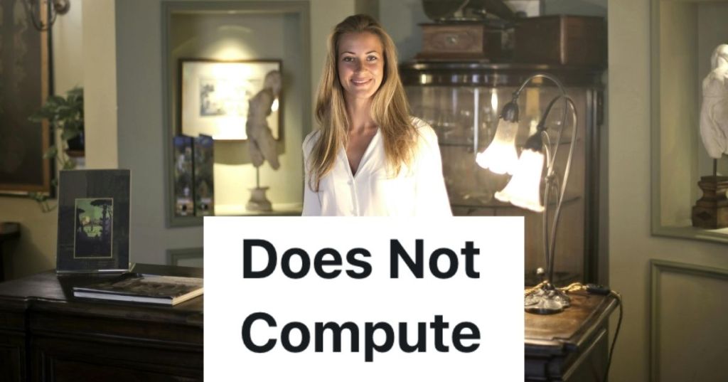 Woman behind hotel front desk