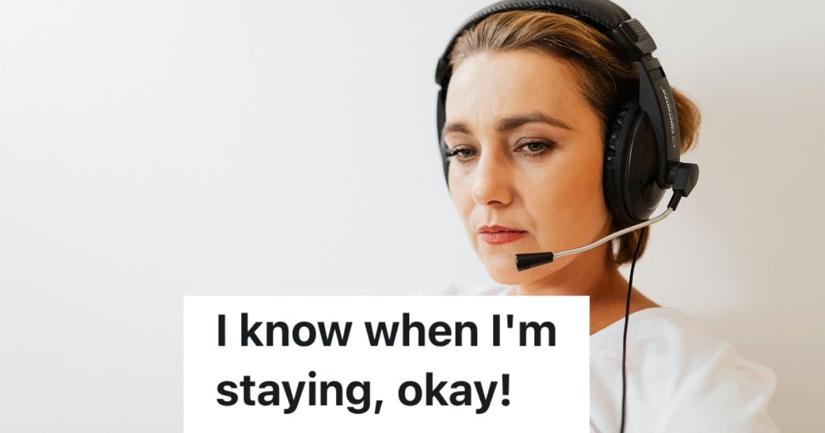 Call center worker wearing headset, looking sad