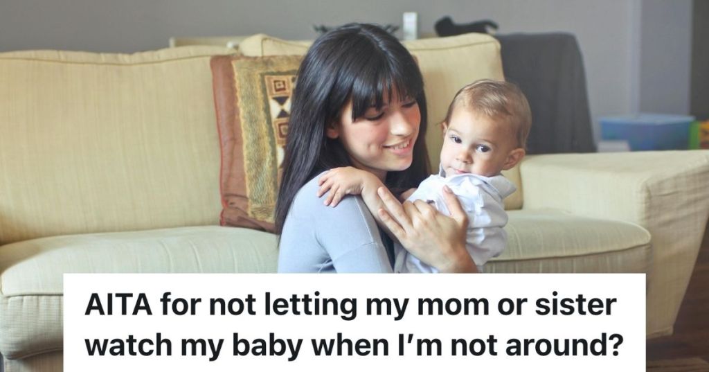 Woman holding a baby beside a couch