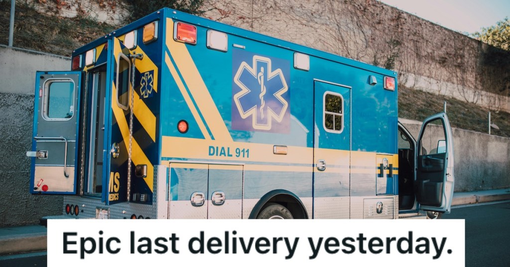 A blue ambulance with back door open