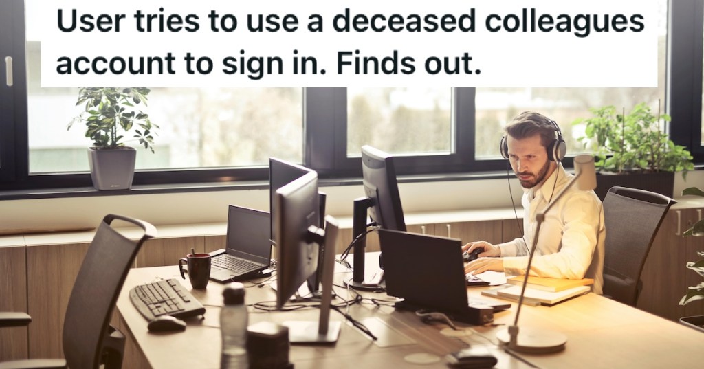 A man in a headset working at a computer