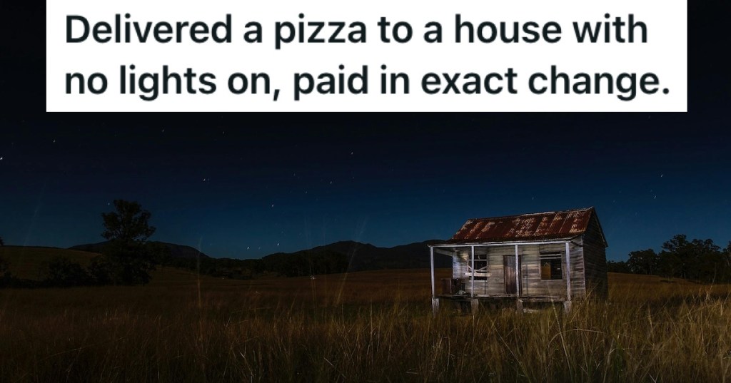 An unlit house at night