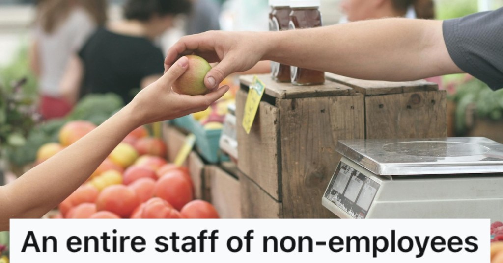 An apple being handed over in a convenience store