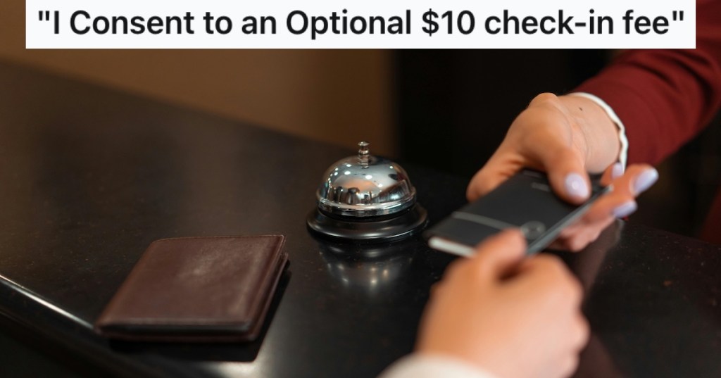 A hotel guest taking a key card