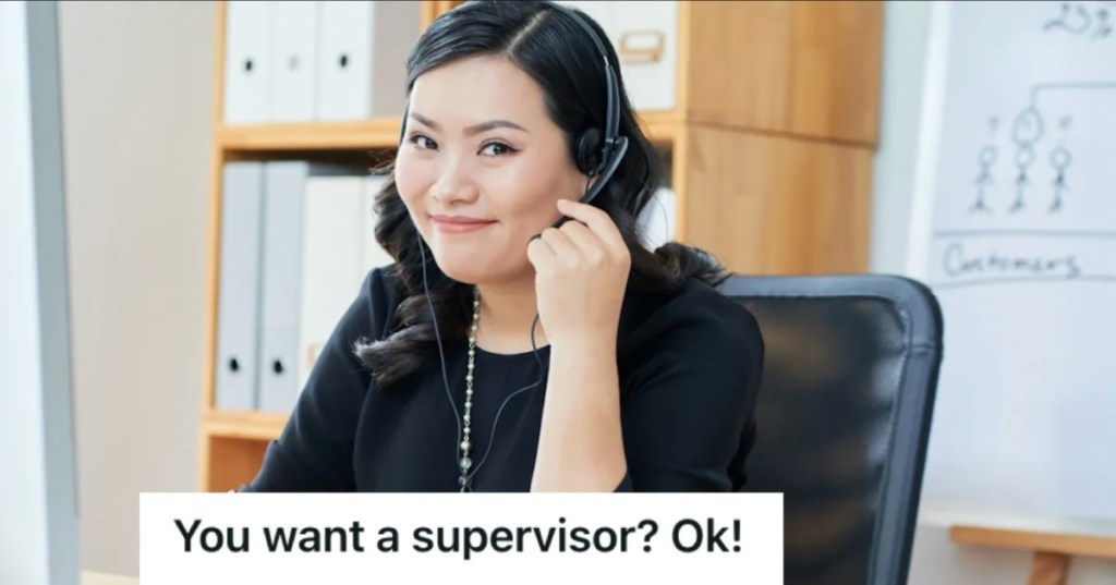 Woman taking a call using her headset in the office