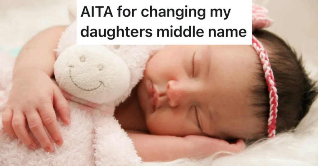newborn baby girl asleep with headband on and cuddling stuffed animal