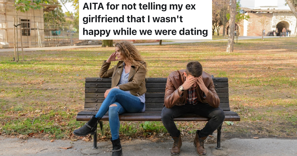 couple sitting on bench and having an argument, not looking at each other
