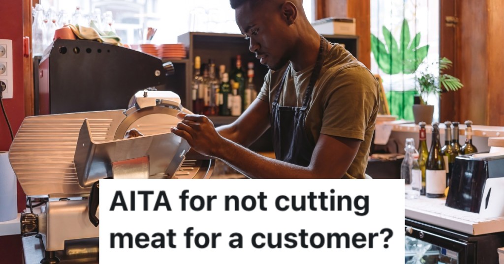 man slicing meat in a deli