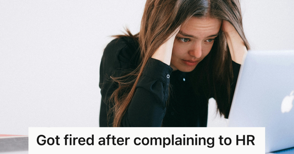 distressed woman looking at her laptop