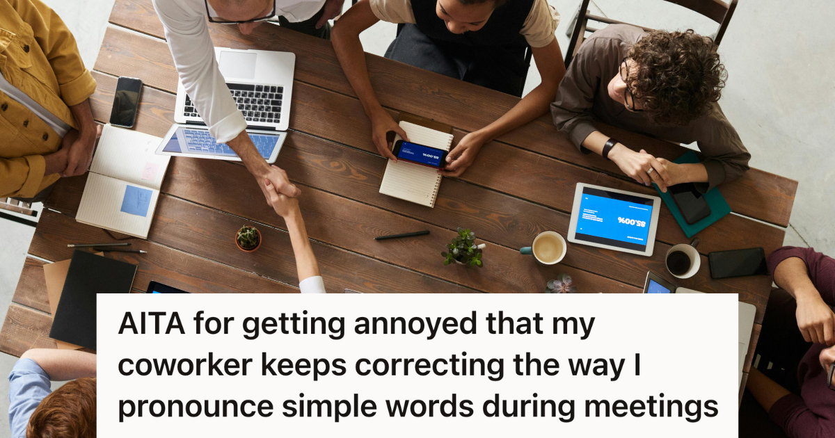 employees sitting around the table having a meeting
