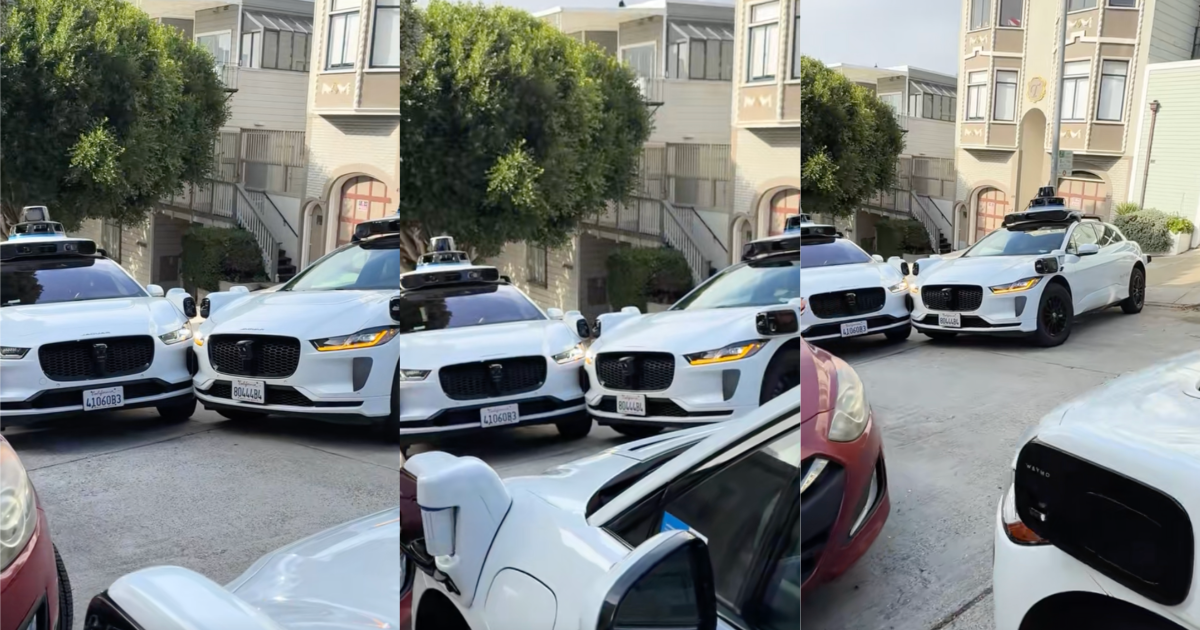 waymo cars on street