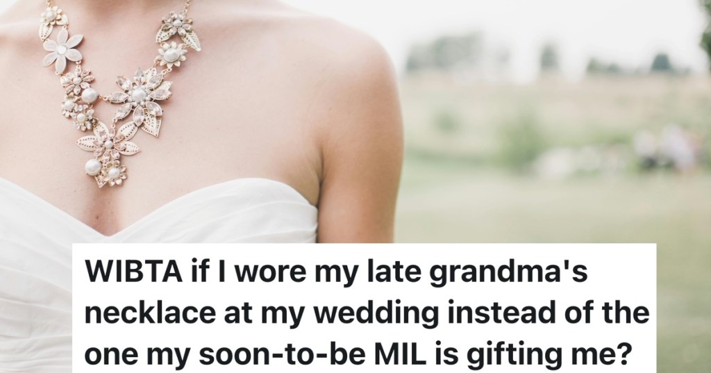 necklace on a bride wearing wedding dress