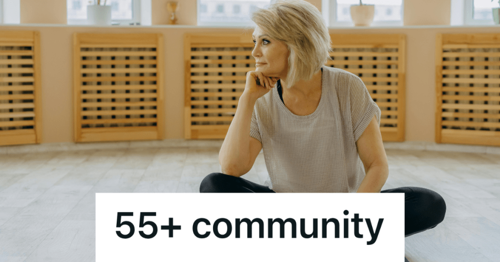 older woman sitting in a yoga studio