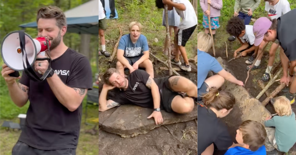 man laying on a rock