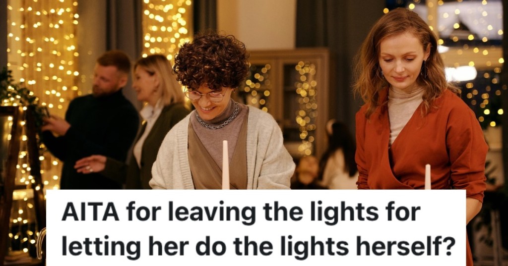 group of people in front of christmas lights