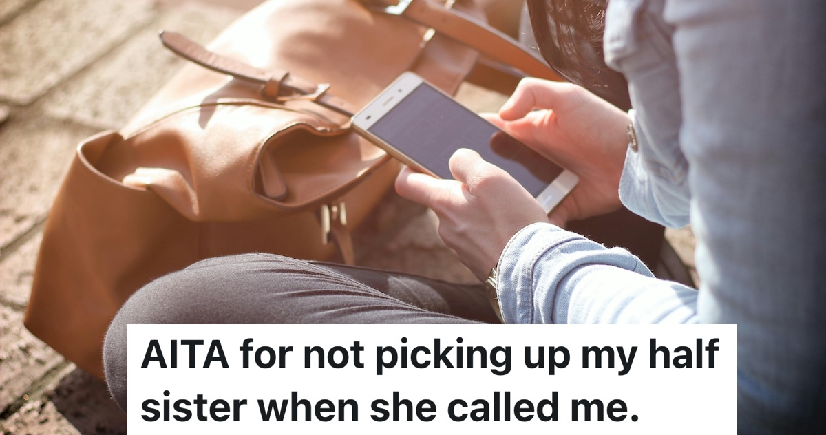 person holding a phone as if to ignore the call