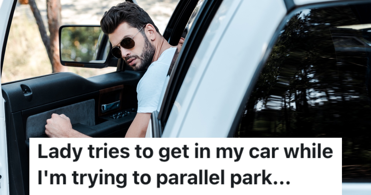 man parallel parking a car