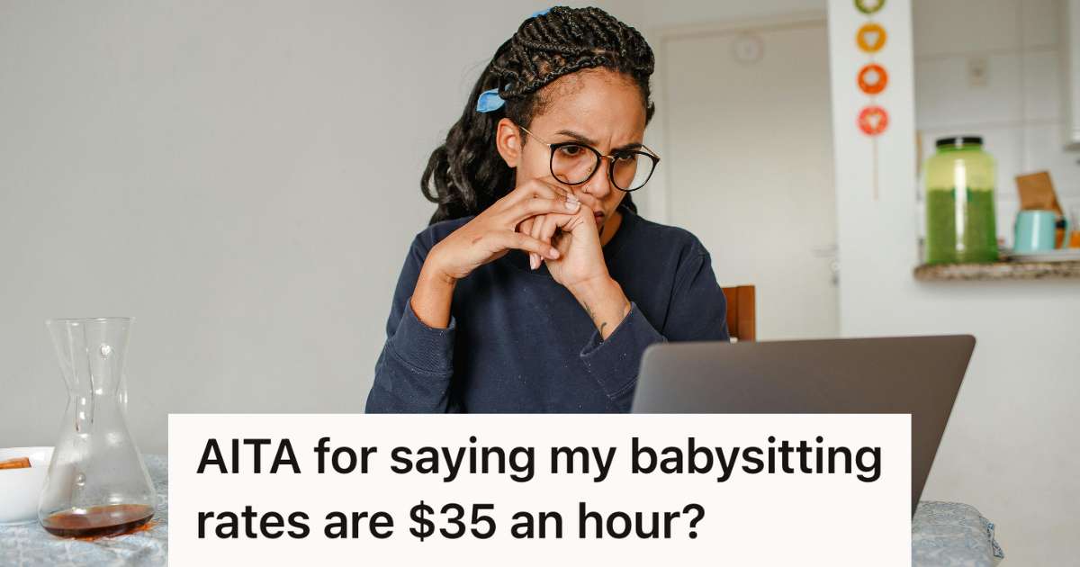 serious looking woman working on her laptop