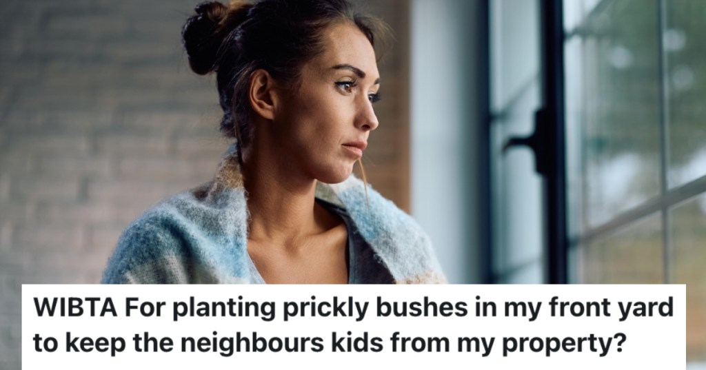 woman looking out a window