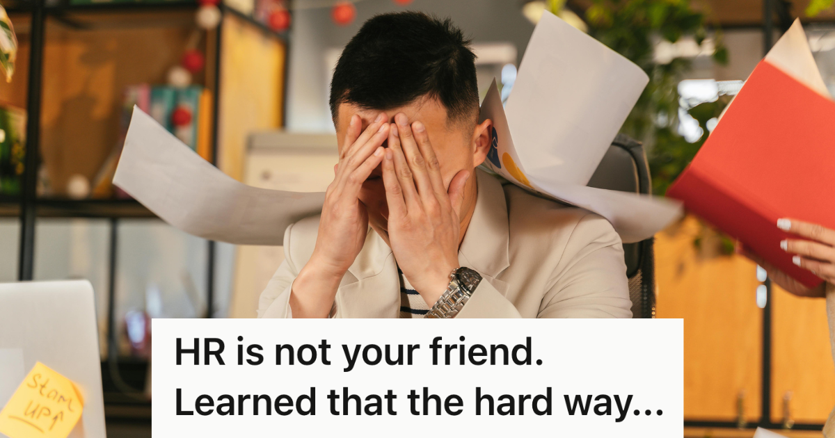 corporate employee with papers flying around him