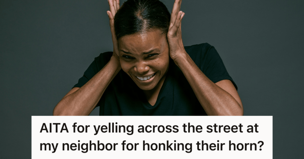 woman covering her ears at a loud sound