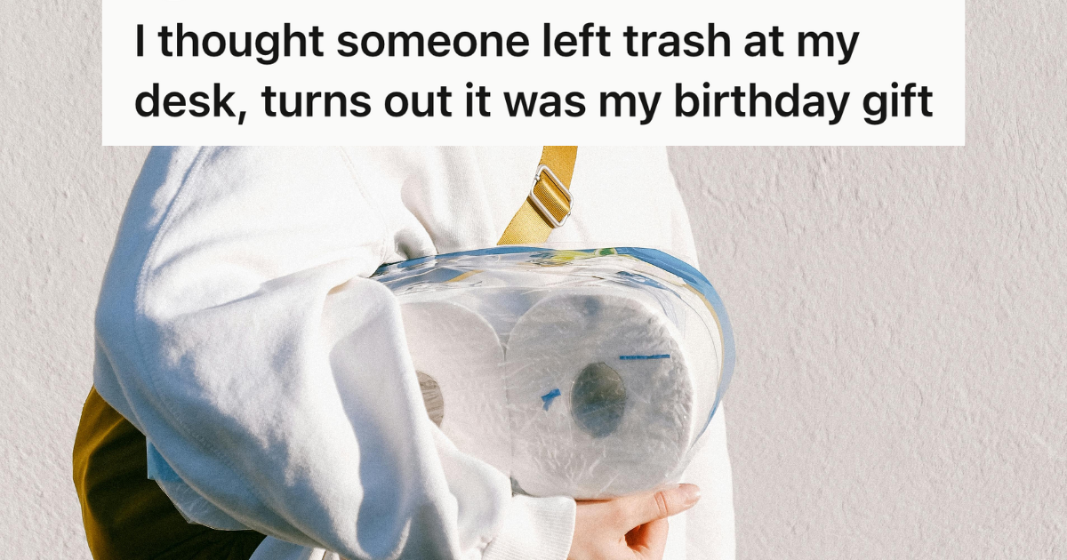 woman in white jacket carrying rolls of toilet paper