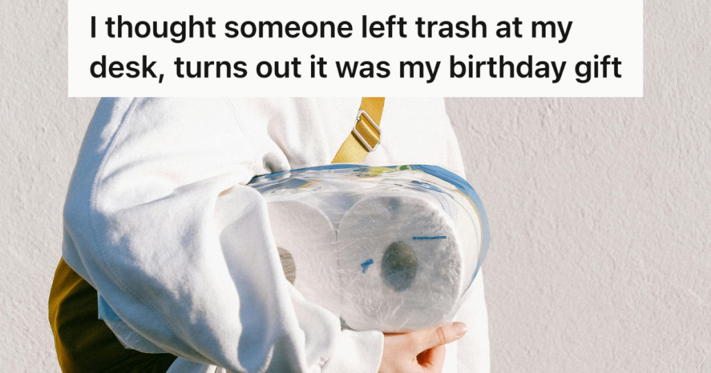 woman in white jacket carrying rolls of toilet paper