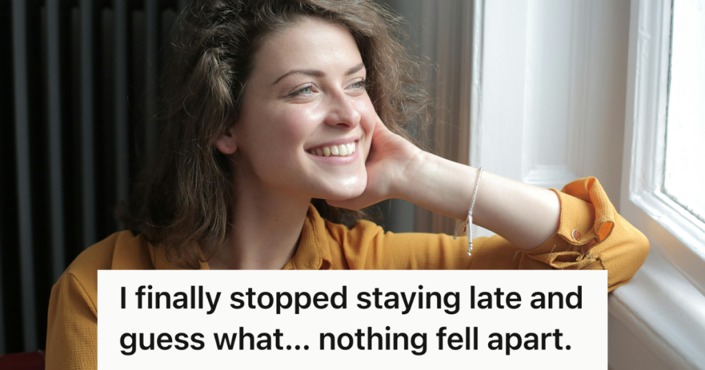 woman in yellow shirt looking out the window