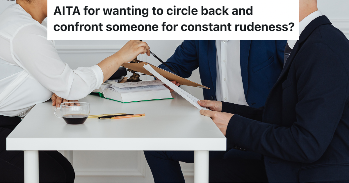 People sitting around a table with papers.