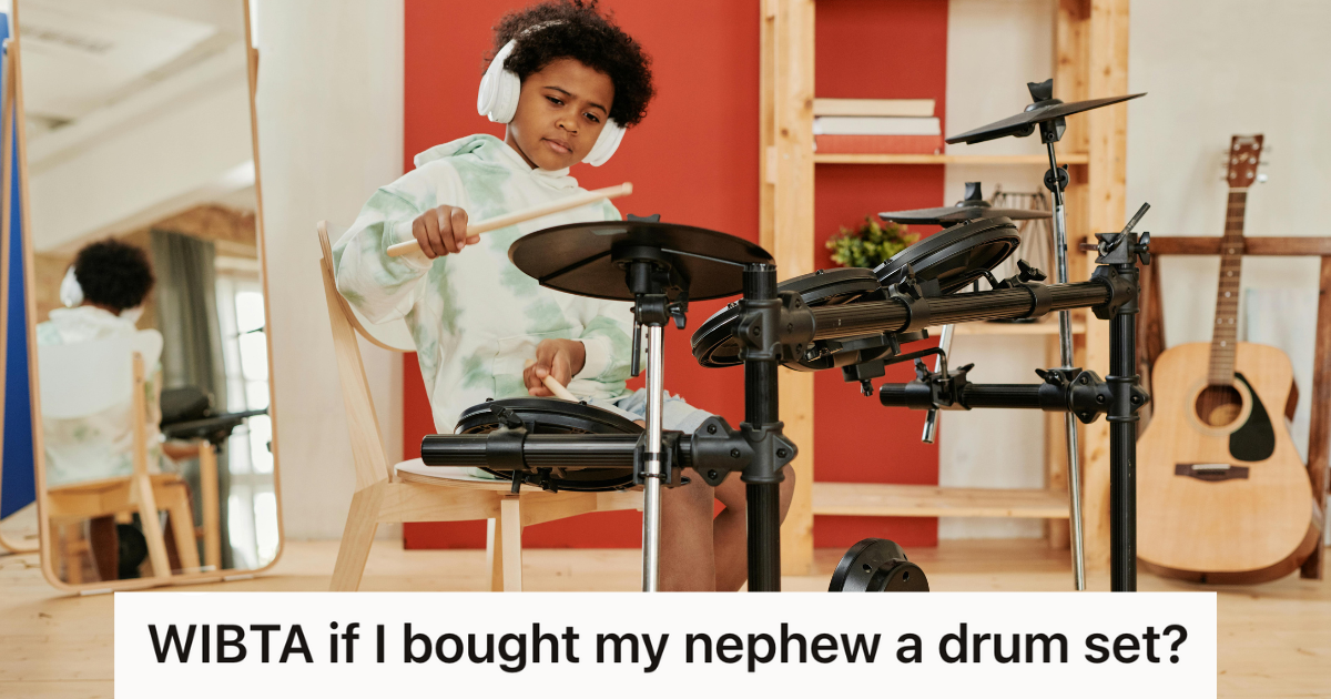 young boy playing a drum set