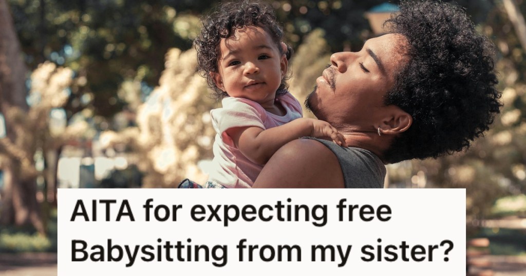 A young father holding his daughter