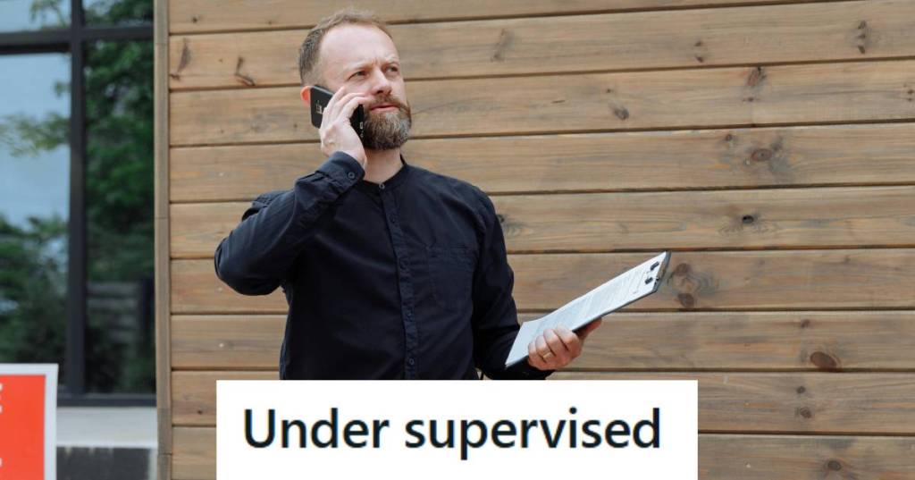 Auditor walking away from a business after being turned away by a line worker