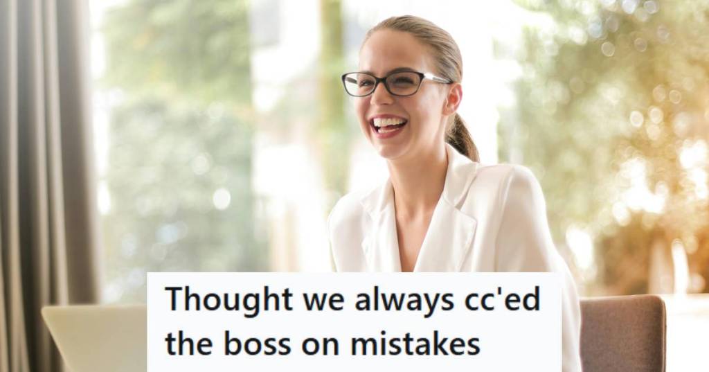 Woman sitting at her desk getting the last laugh after many years