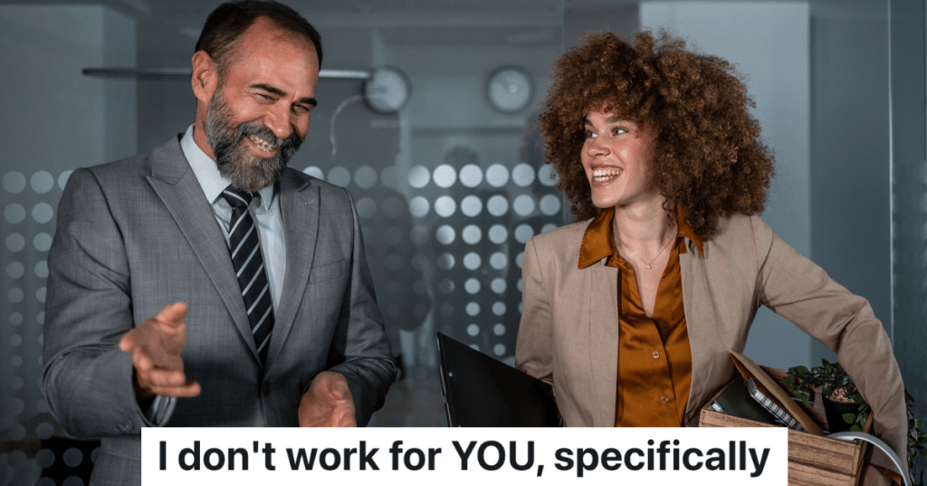 two business workers, one older man and one younger woman, laughing