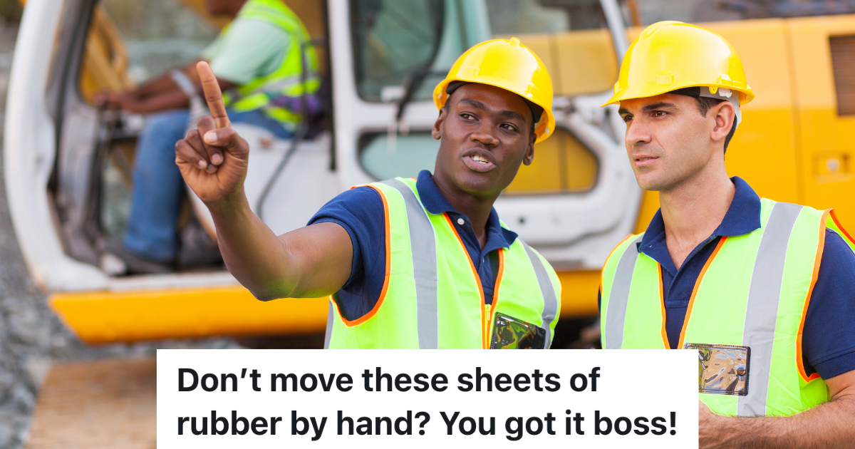 two construction workers talking while one points