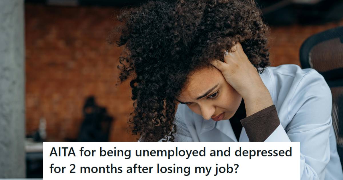 Woman holding her head because she's depressed and tired of looking for a job