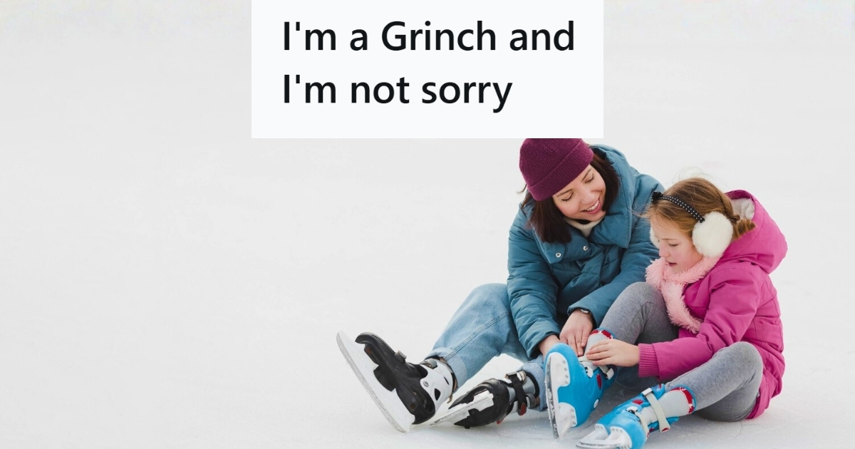 Mother helping daughter with ice skates