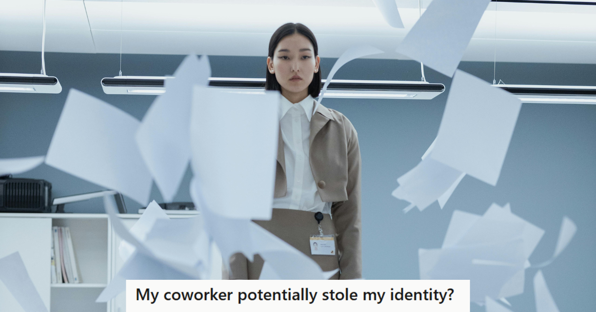Woman standing on desk with papers flying