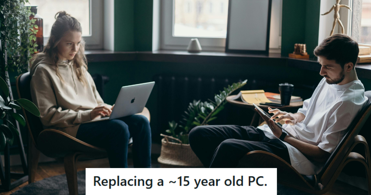Man and woman working on their computers