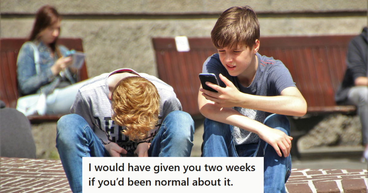 two boys sitting and playing together