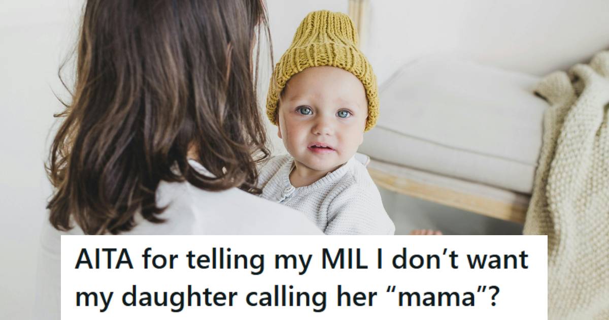 Woman holding her young child who's looking at the camera