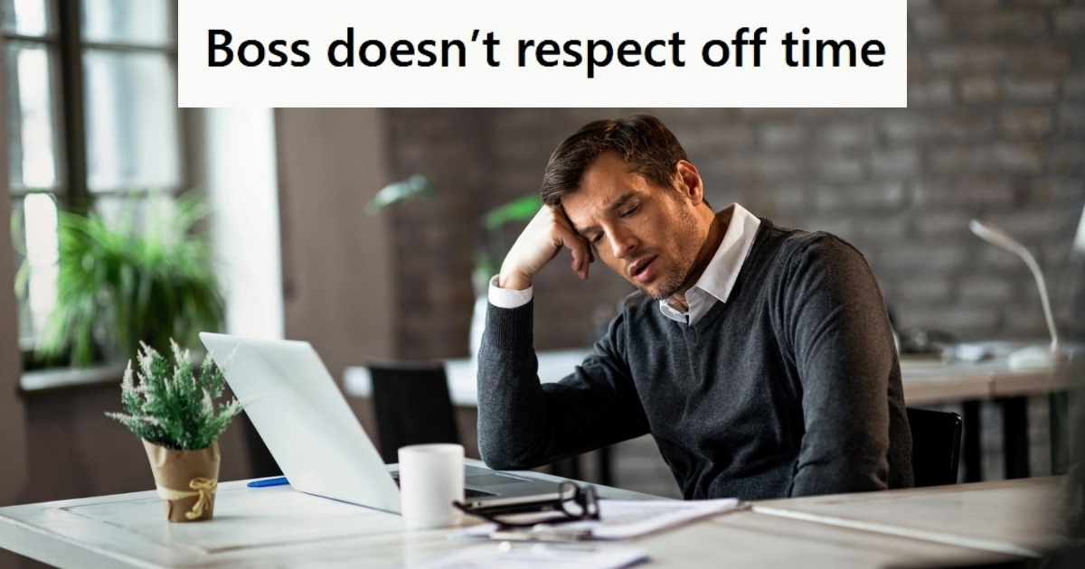 Tired man sitting at work desk