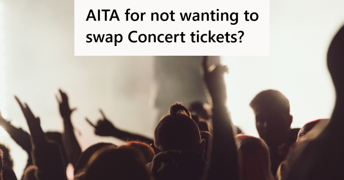 People enjoying rock concert