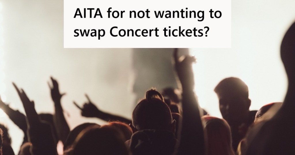 People enjoying rock concert