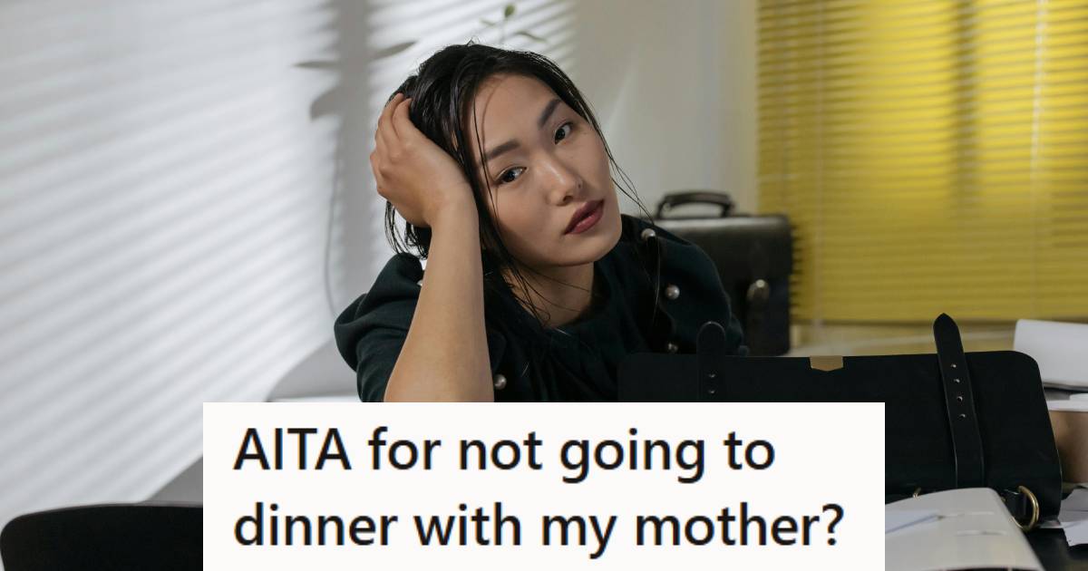 Woman sitting at the table, holding her head, wondering if she's wrong