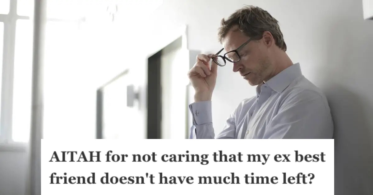 Man taking off his glasses